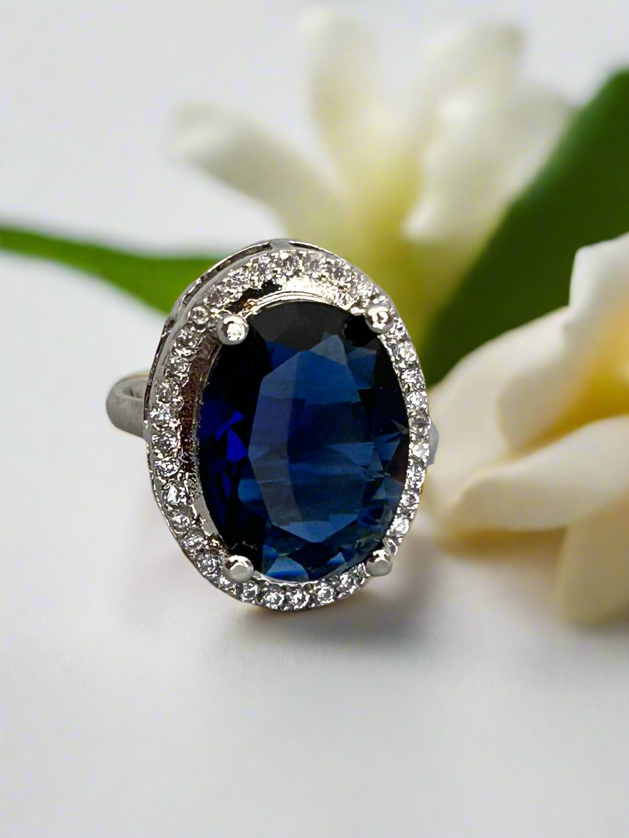 Cluster AD and Blue Sapphire Oval Ring