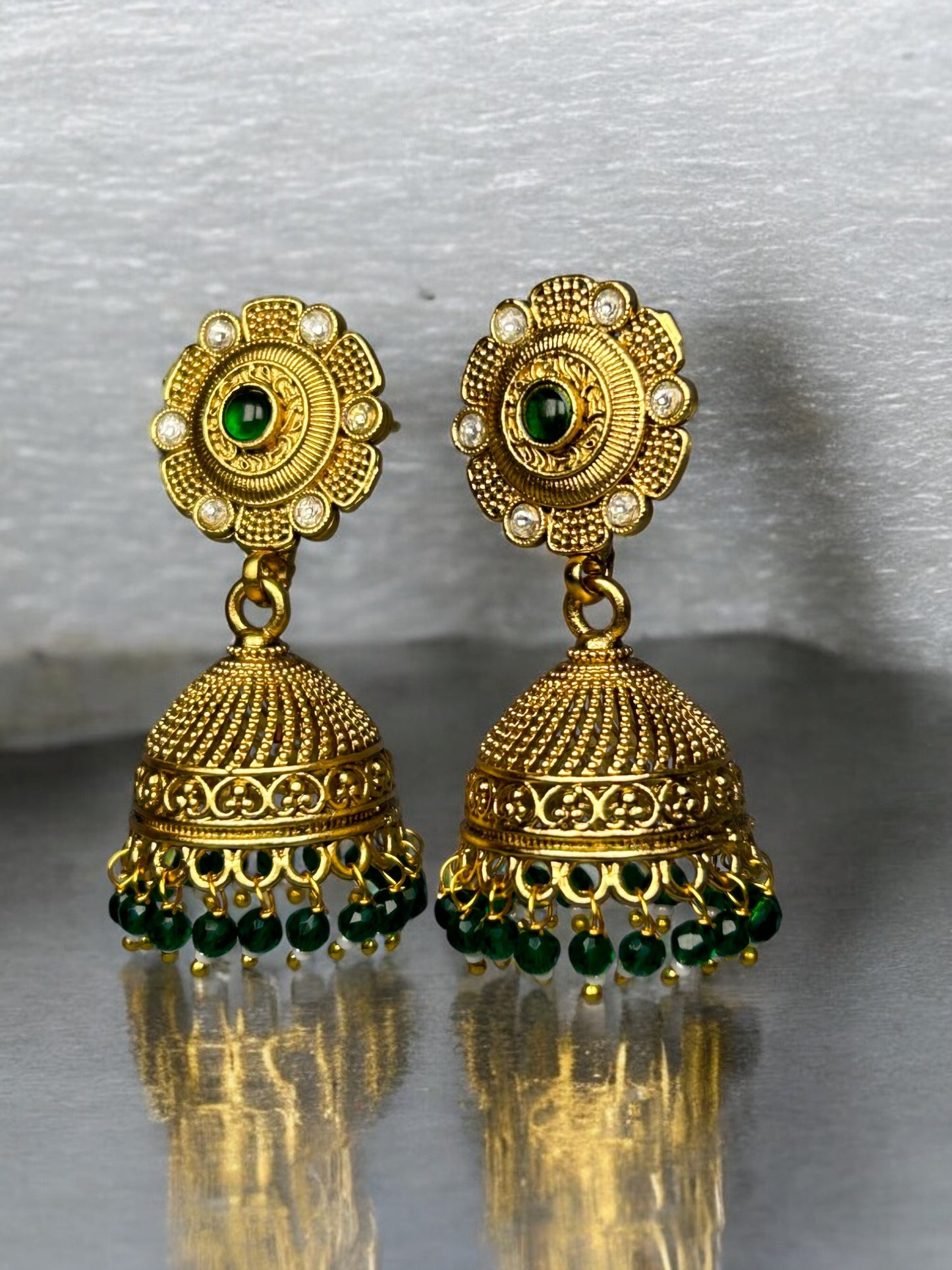 Gold Jhumkis with AD and Emerald Beads