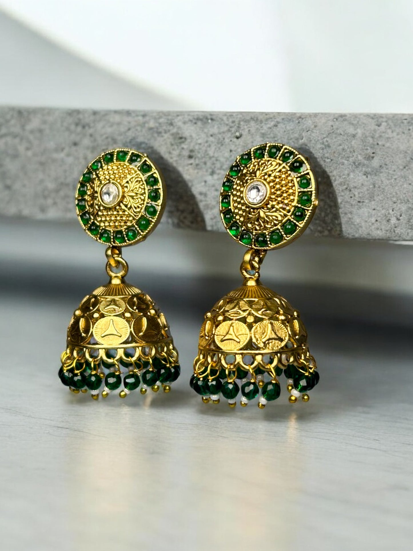 Gold Jhumkas with Emerald Beads