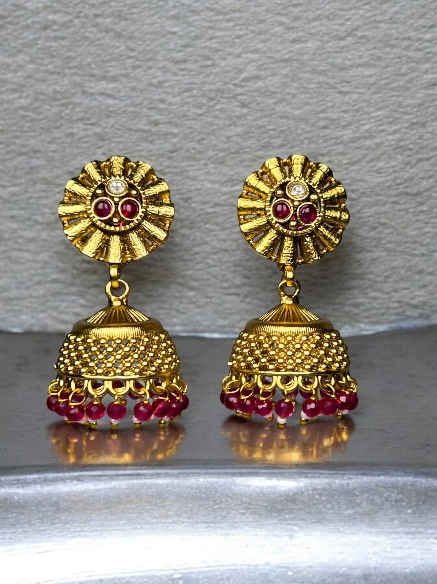 Gold Jhumkas with AD and Ruby Beads