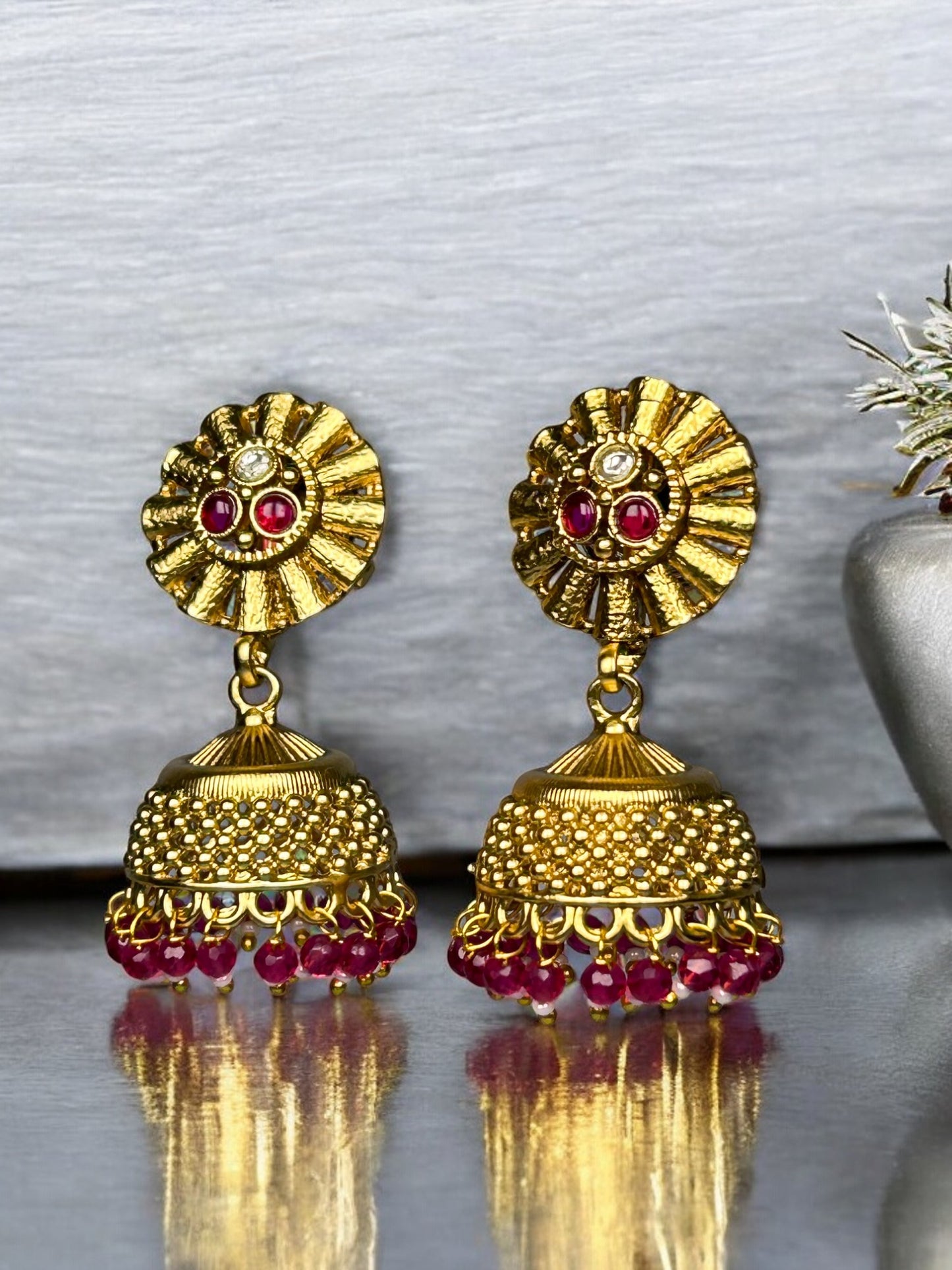 Gold Jhumkas with AD and Ruby Beads