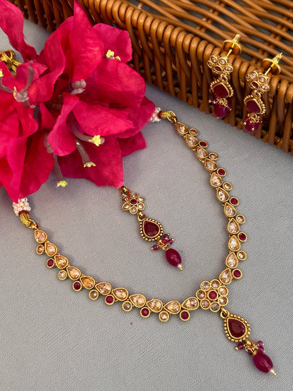 Intricate Gold, Ruby and AD Necklace Set with Mang Tika