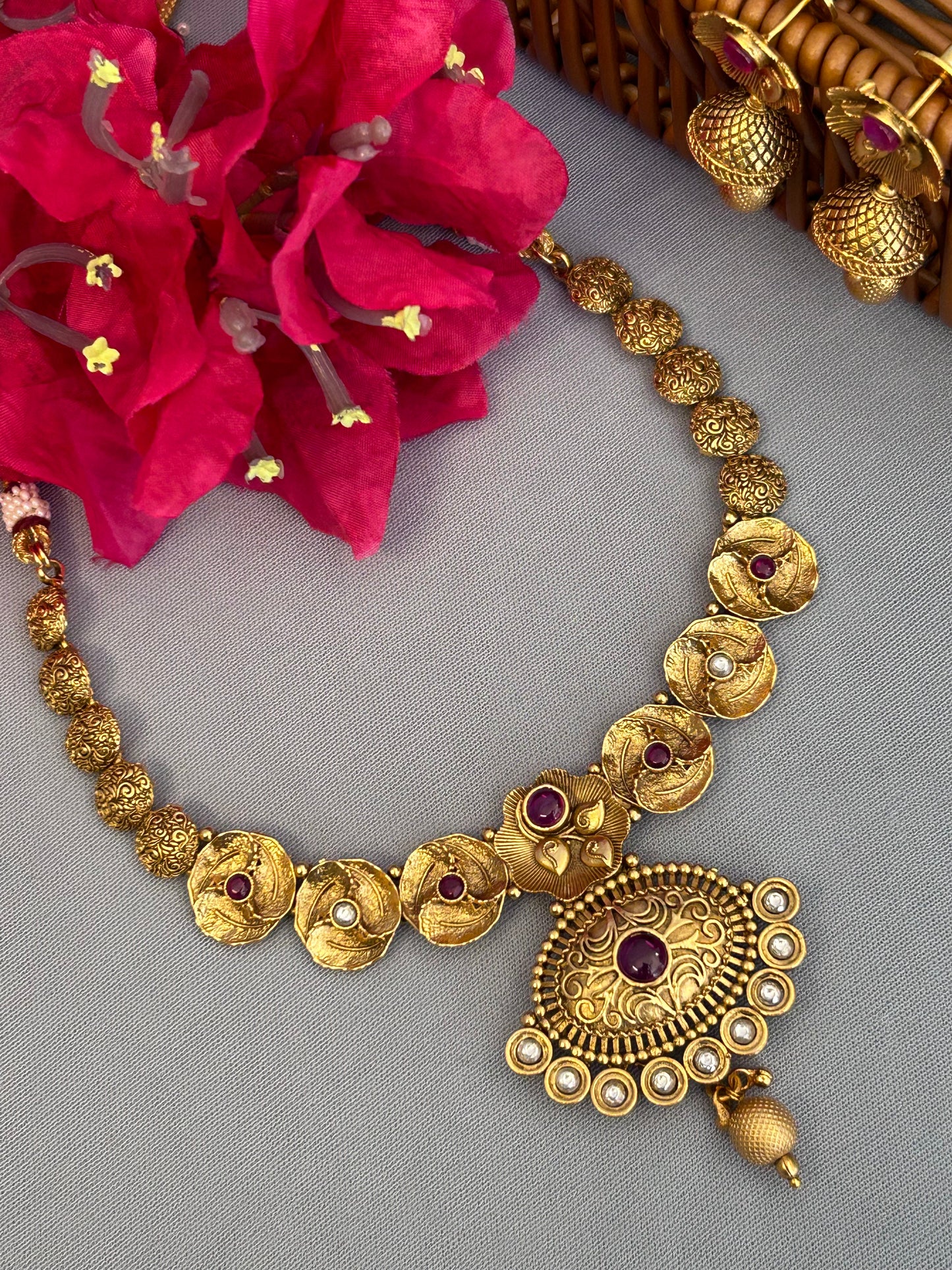 Quirky Antique Gold Necklace with Magnificent Locket and Cute Jhumkas