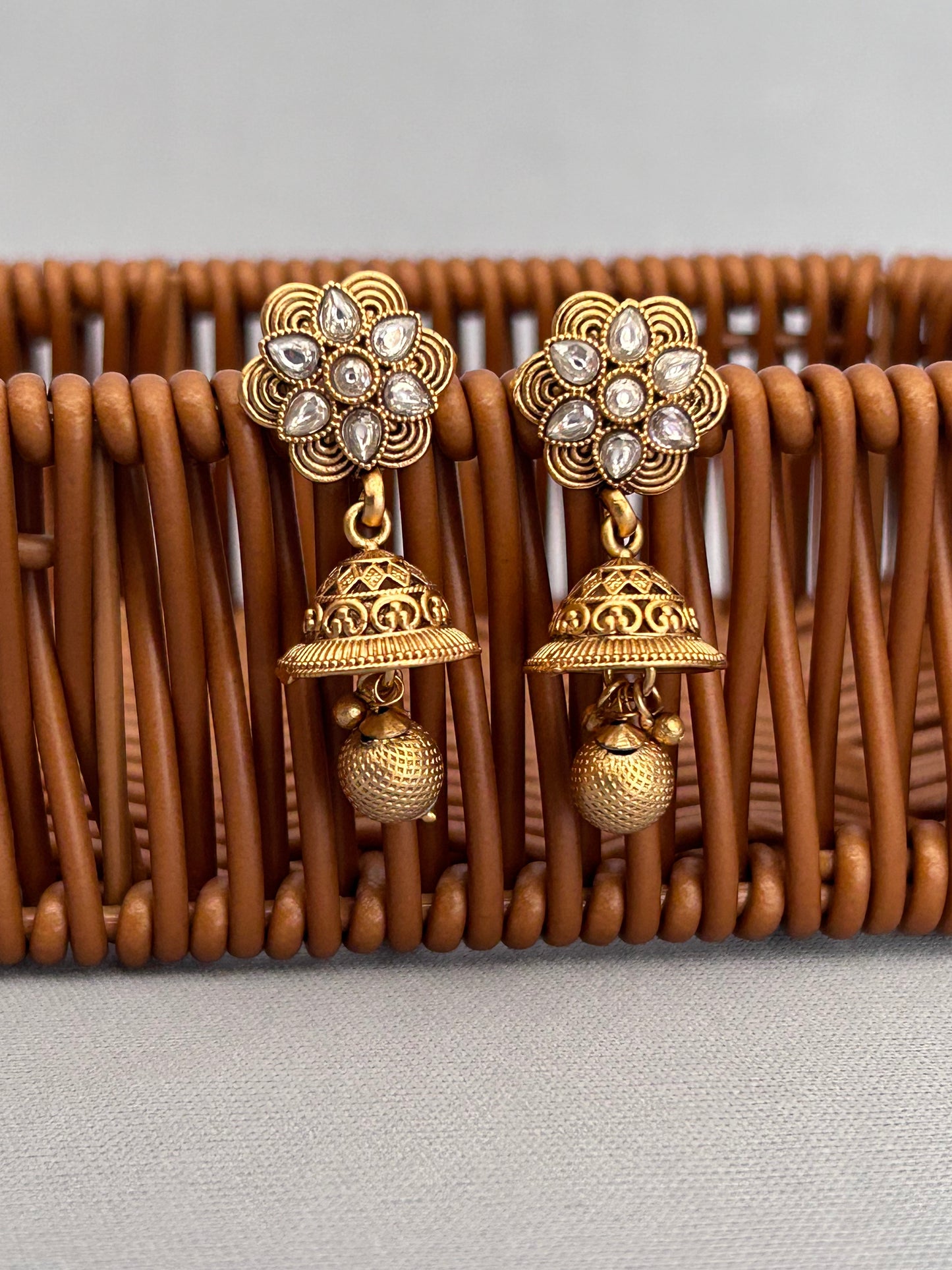 Antique Gold Necklace with Diamond Studded Locket and Intricate Jhumkas