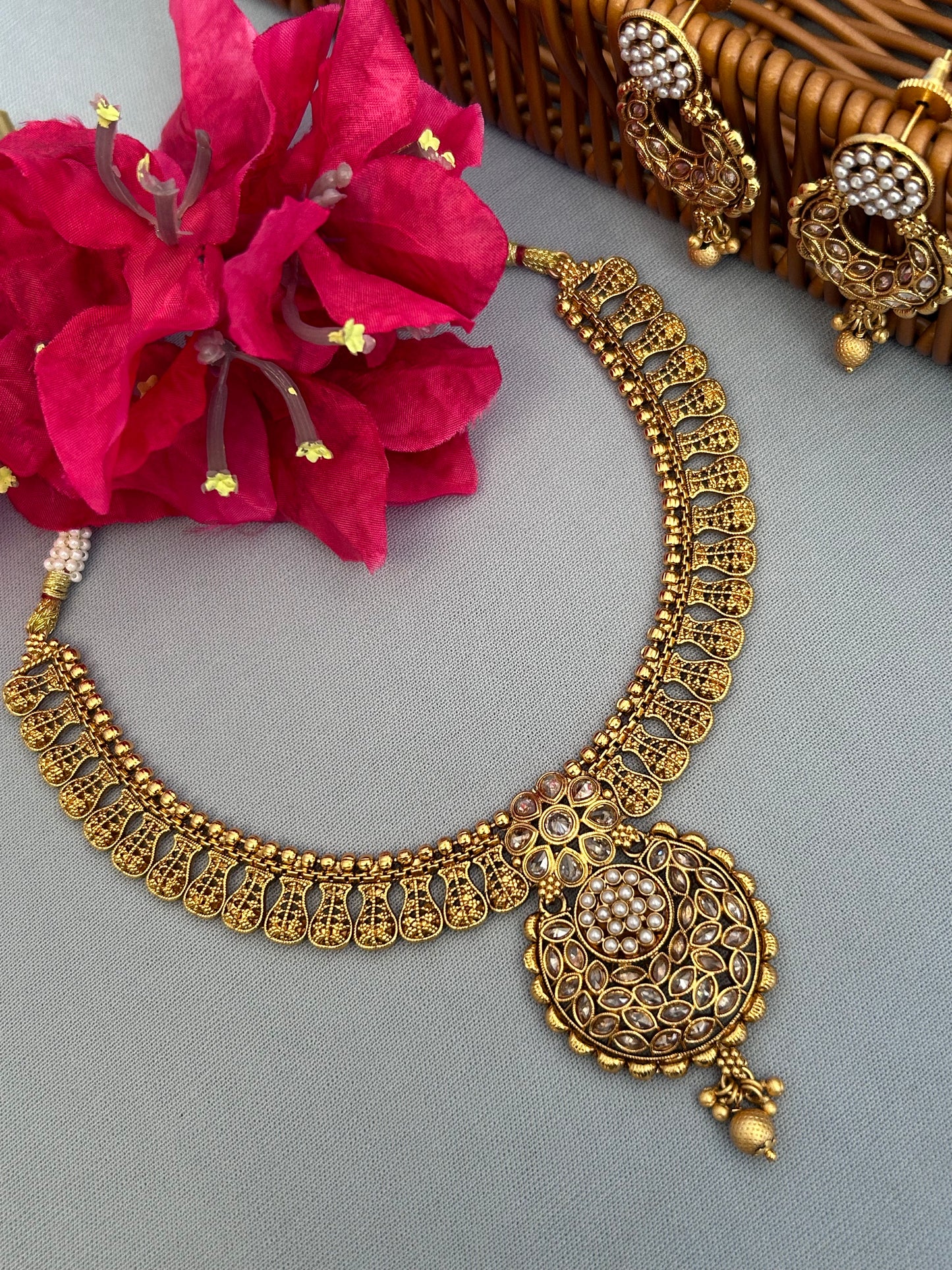 Intricate Gold Necklace Set with Diamonds and Pearls Cluster Locket