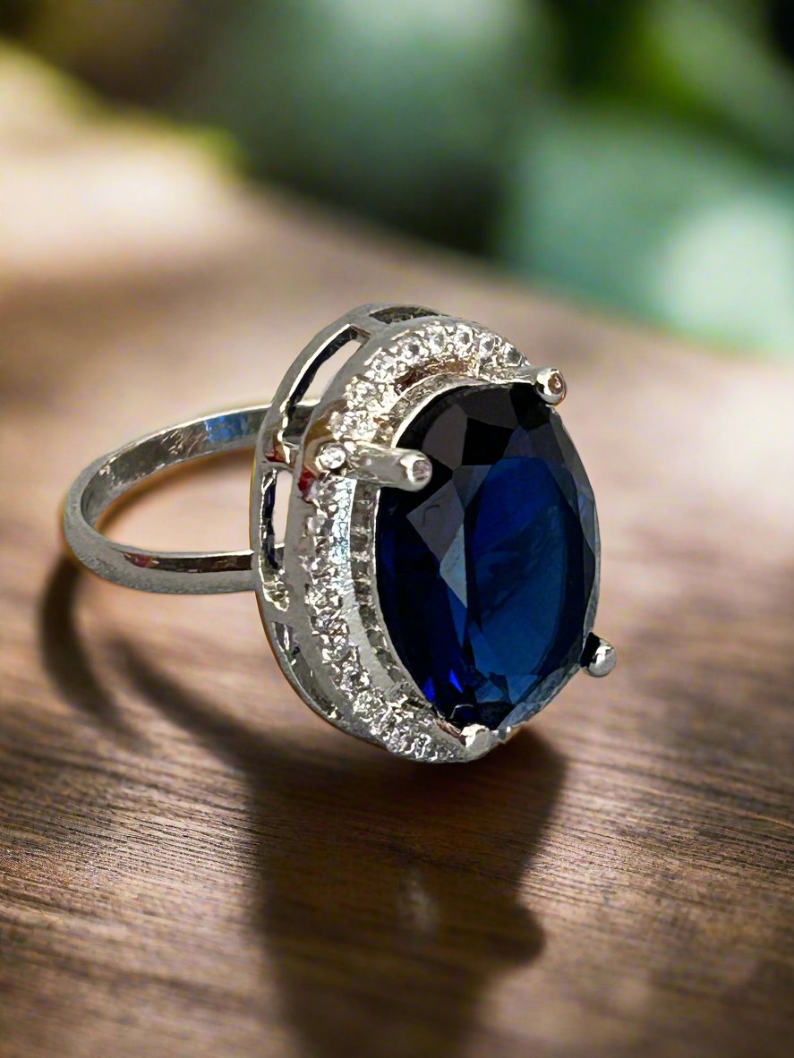 Cluster AD and Blue Sapphire Oval Ring