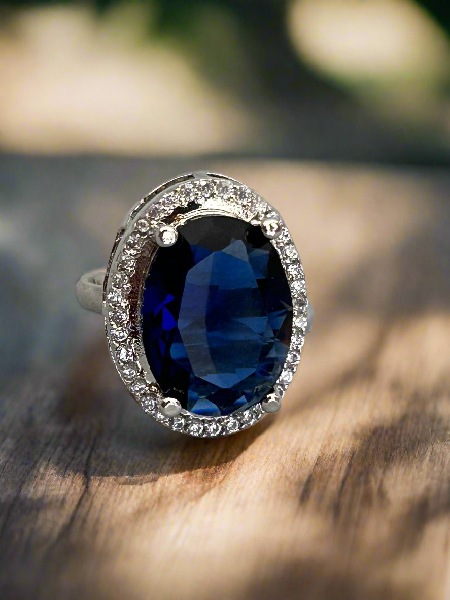 Cluster AD and Blue Sapphire Oval Ring